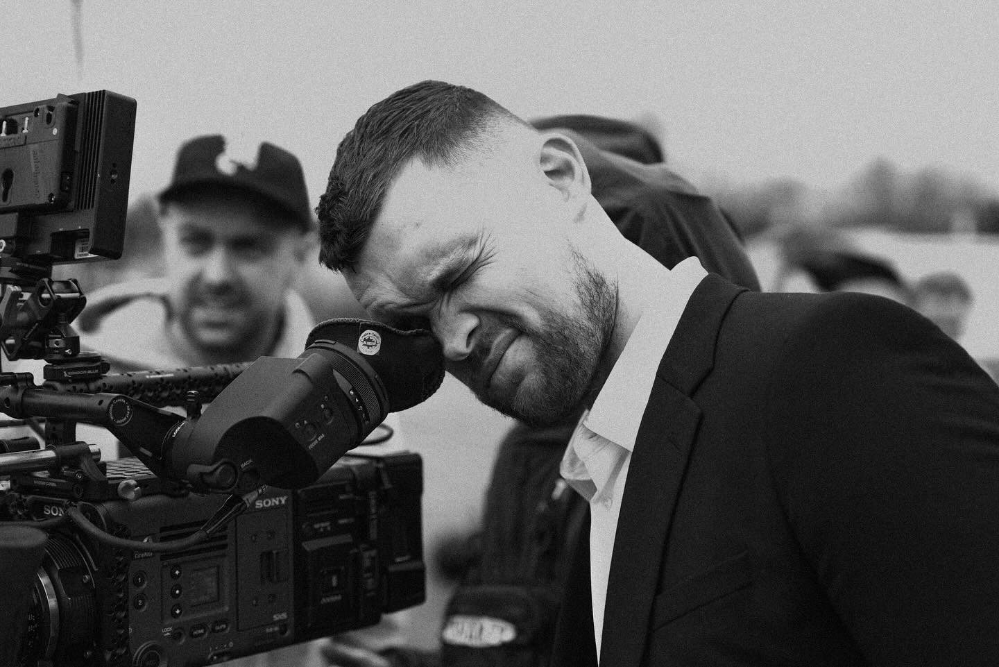 12 directing behind a Sony cinema camera on set
