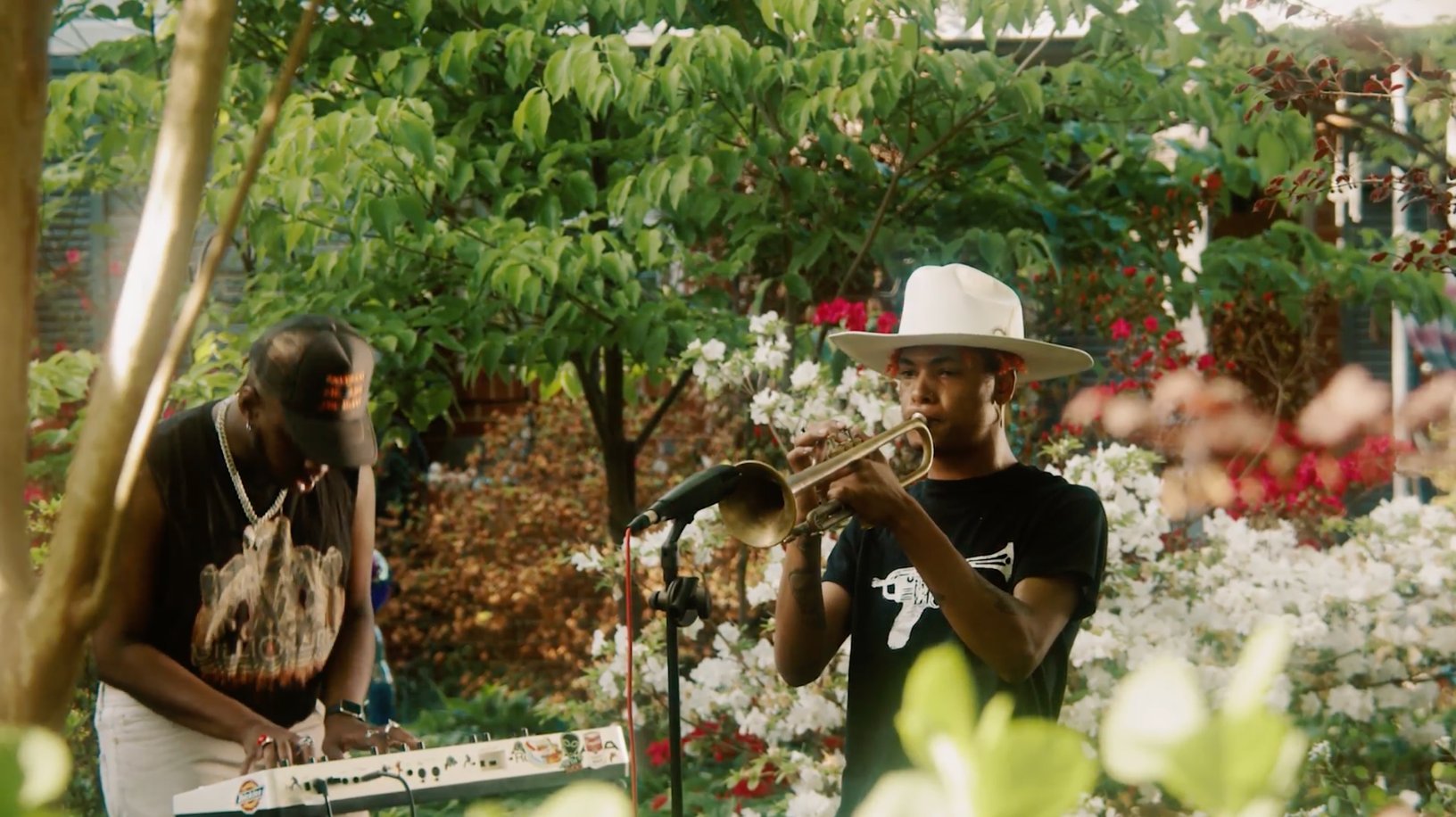 Midnight Sessions — Brax & Noli — keyboardist and trumpet player performing in a garden