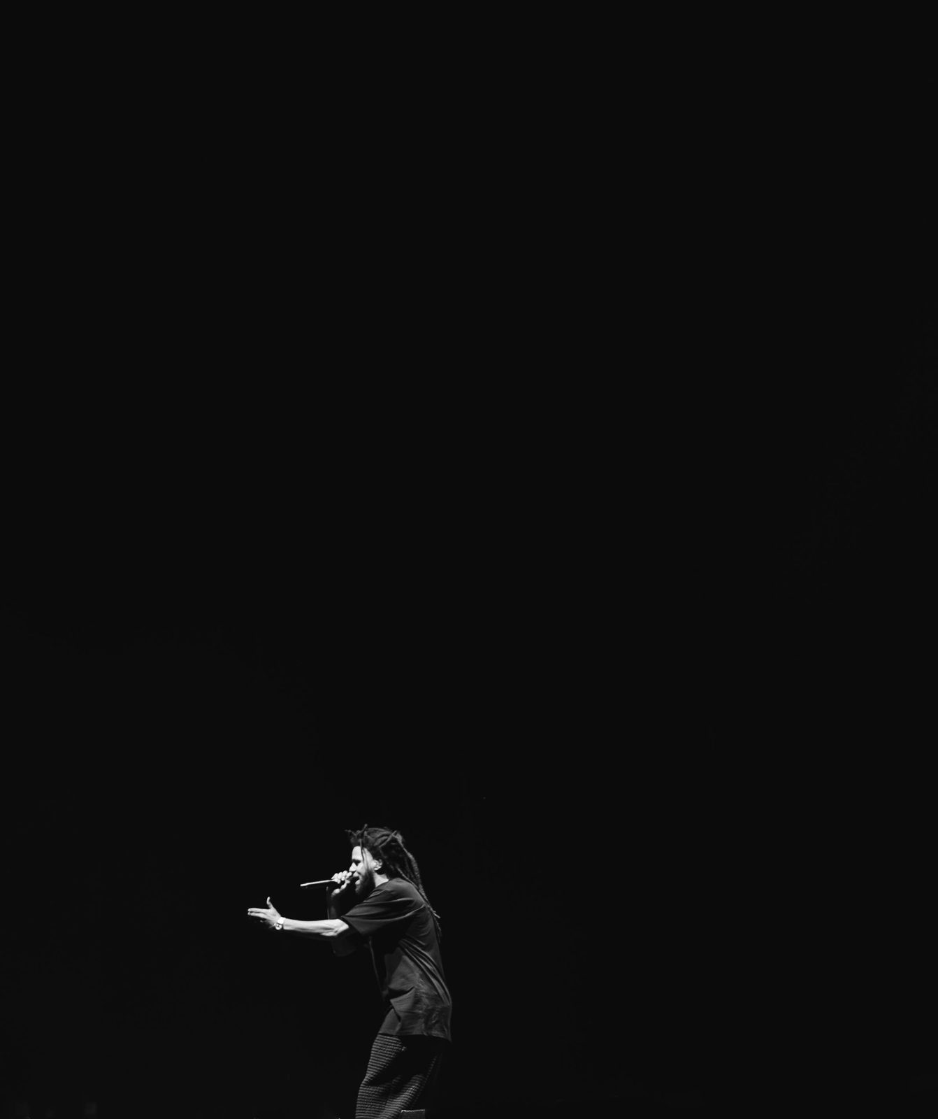 J. Cole performing